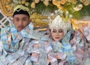 Viral Gaun Pengantin Dikalungi Uang Ratusan Juta di Bangkalan