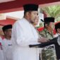Bupati Sumenep Achmad Fauzi Wongsojudo (tengah) memimpin apel Peringatan Hari Santri Nasional (HSN) 2026 dari podium utama, didampingi jajaran Forkopimda Sumenep dan Wakil Bupati KH. Imam Hasyim di halaman Kantor Bupati Sumenep.
